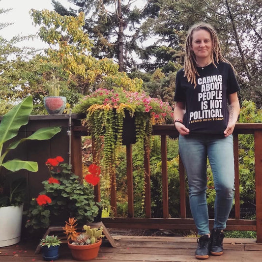 Caring About People Is Not Political Unisex Donation T-Shirt: 100% of Proceeds Donated to Ahwatna