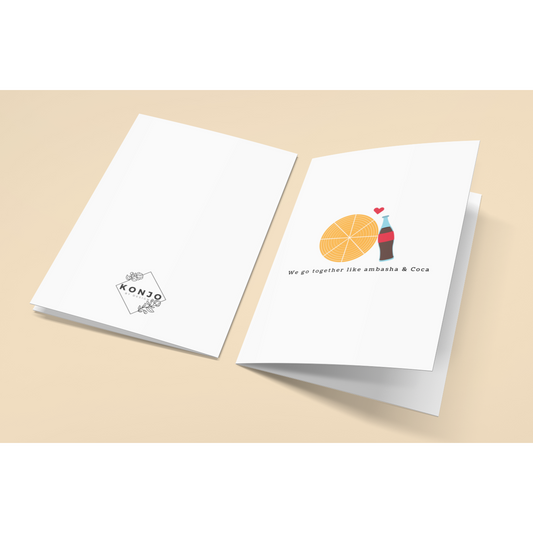 We Go Together Like Ambasha And Coca Card | Habesha Ethiopian Eritrean Card Shop our original art, greeting cards, coffee mugs, stickers, hats, shirts and crewnecks all inspired by our Eritrean and Ethiopian-American perspectives, experiences, and points of view. Perfect Habesha Gift